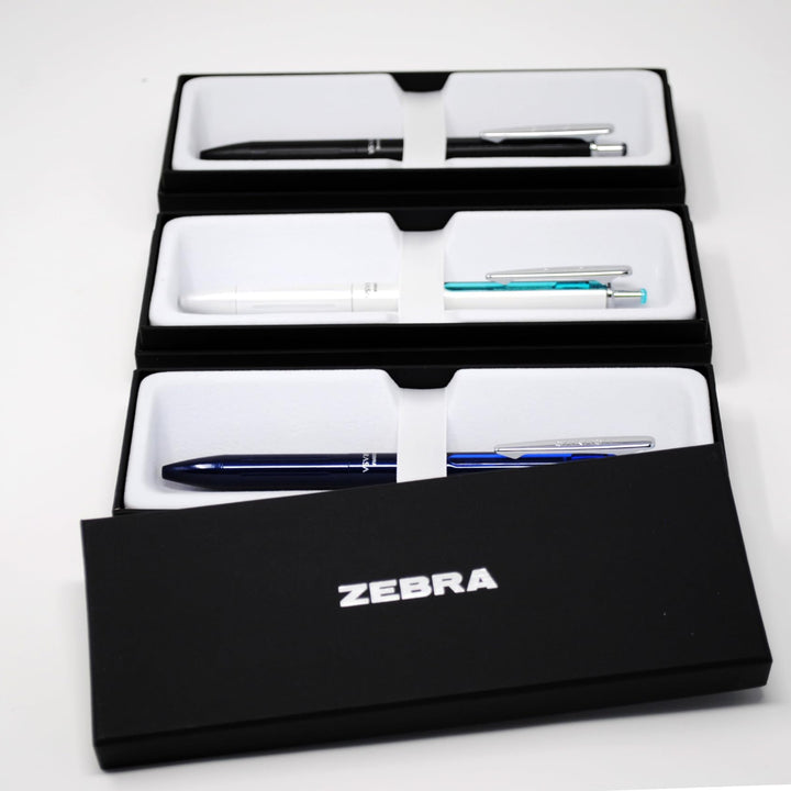 Zebra Pen Sarasa Grand Retractable Gel Pen Gift, White/Black/Navy Barrel, Mediun Point, 0.7mm, Black Ink, 3 Count (Pack of 1)