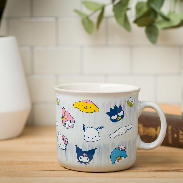 Silver Buffalo Sanrio Hello Kitty and Friends Featuring My Melody, Badtz-Maru, Pochacco, Keroppi, Pompompurin, Cinnamoroll, Kuromi, and Tuxedo Sam Reactive Glaze Ceramic Camper Mug, 20 Ounces