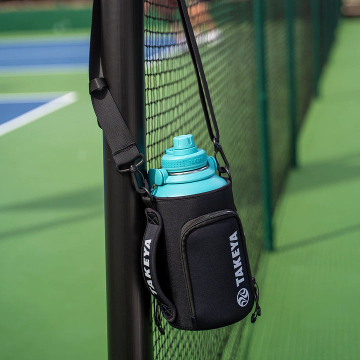 Takeya Hydrotex Easy Grip Bottle Sling, Water Bottle Carrier With Strap and Pockets, Fits 64 oz Bottles, Great for Pickleball and Tennis Courts