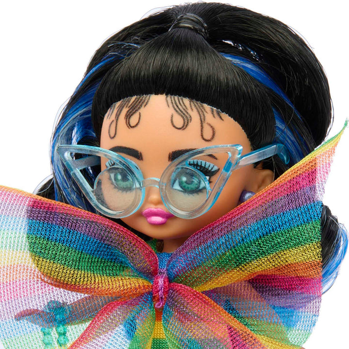 Barbie Extra Mini Minis with Blue-Streaked Black Ponytail Wearing Rainbow Dress & Accessories & Stand, 3.25-inch 3.25 inch