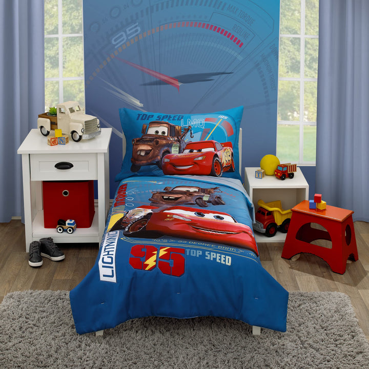 Disney Cars Piston Cup Circuit Blue, Red, and Yellow, Lightning McQueen and Mater 4 Piece Toddler Bed Set - Comforter, Fitted Bottom Sheet, Flat Top Sheet, and Reversible Pillowcase Disney Cars Piston Cup